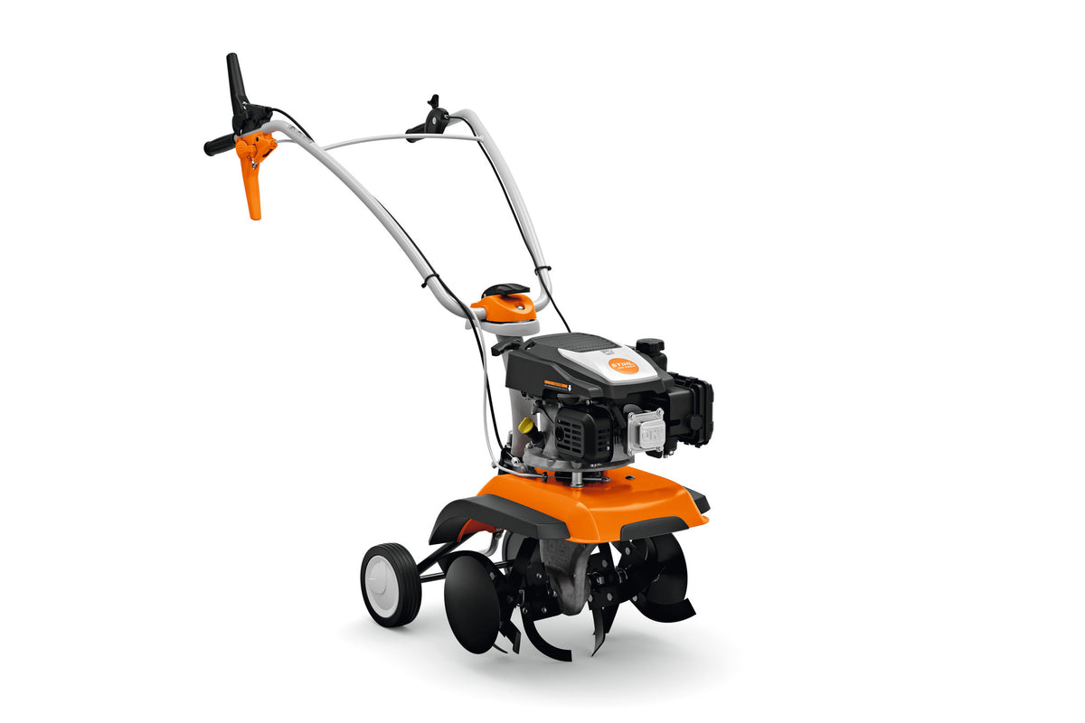 Motozappa Stihl MH 445 R con manubrio, motore, frese e ruote di trasporto, vista laterale.