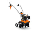 Motozappa Stihl MH 445 R con manubrio, motore, frese e ruote di trasporto, vista laterale.